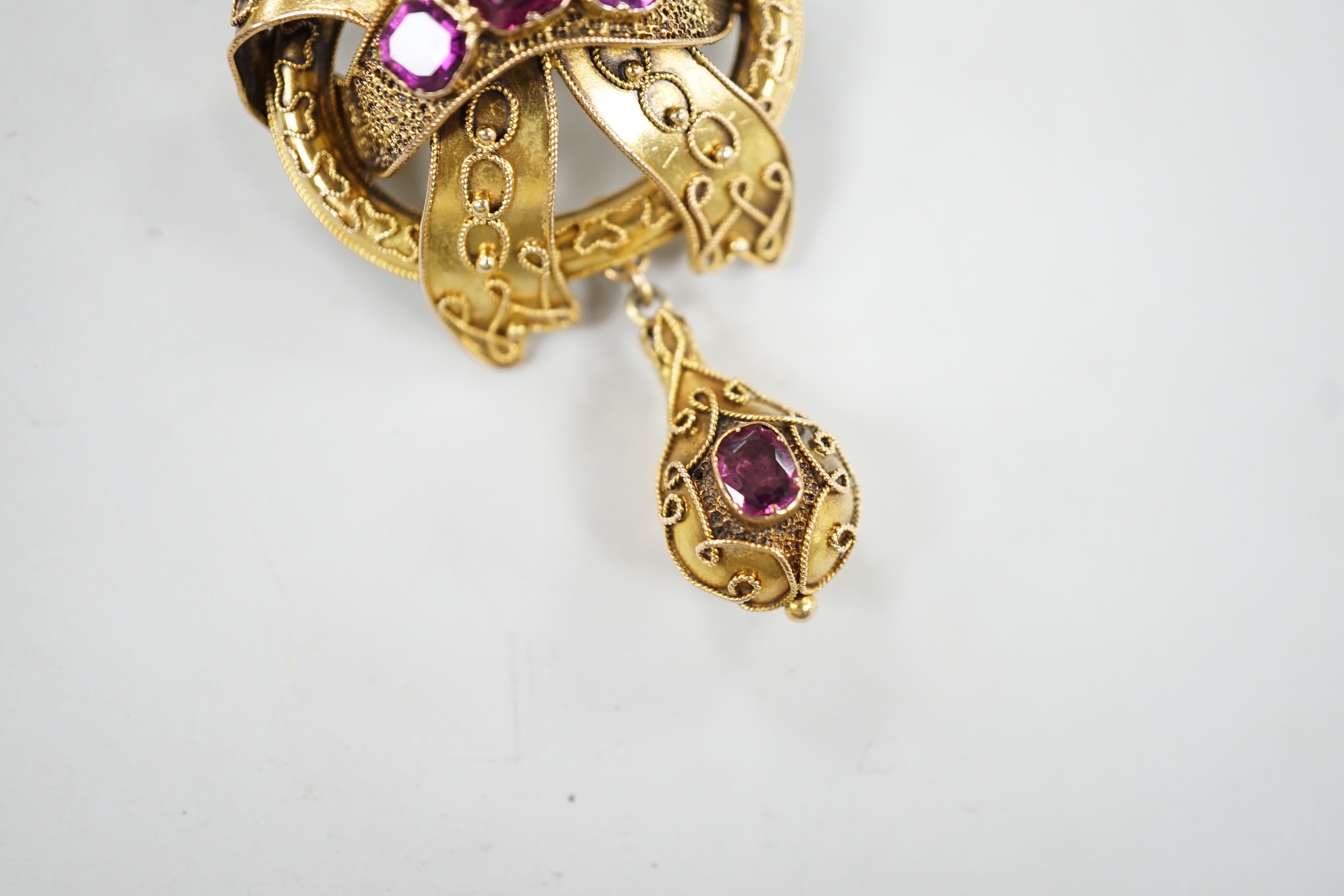 A Victorian yellow metal and foil backed garnet? set cannetile work drop brooch, 56mm, gross weight 12.7 grams.